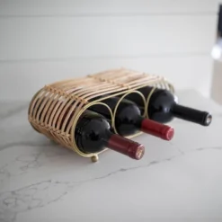 Wrapped Brass Metal & Rattan Wine Bottle Holder - Foreside Home & Garden 13 Wrapped Brass Metal & Rattan Wine Bottle Holder - Foreside Home & Garden -Decor Home Life Store GUEST fc8bc5e7 9fb7 4476 bb9e 496bcce06cda